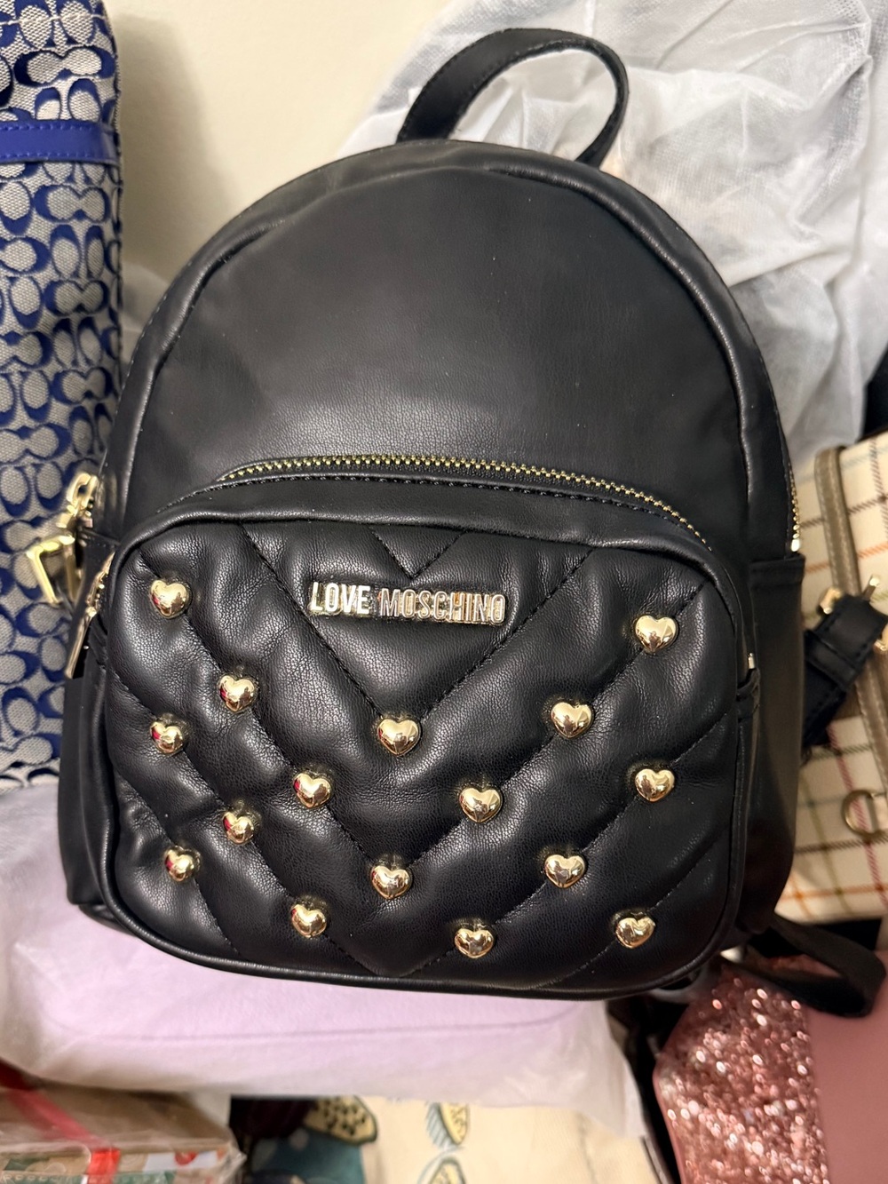 Love Moschino Black Quilted Mini Backpack with Gold Heart Studs